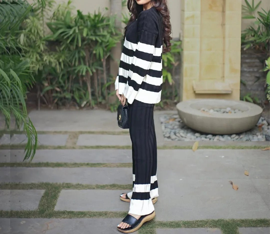 Black and cream striped knit set with sweater and wide-leg pants