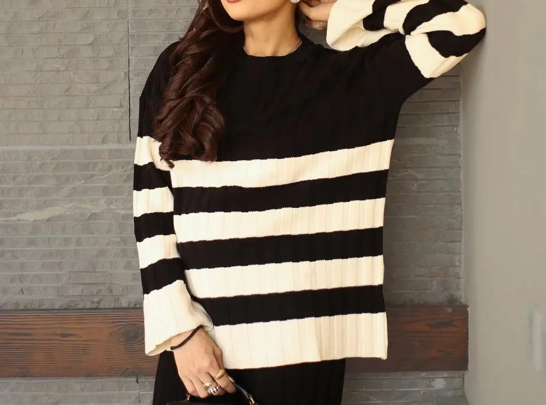 Black and cream striped knit set with sweater and wide-leg pants