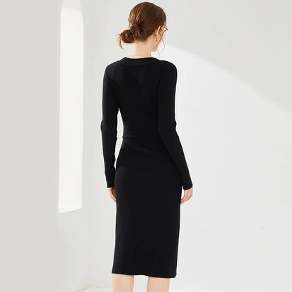 Black fitted midi dress with V-neck and button details
