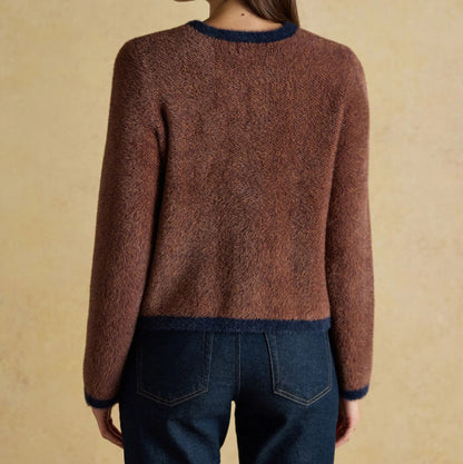 Brown knit cardigan with contrast trim and button closure