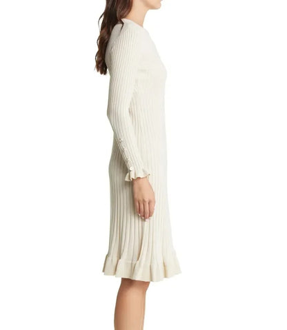 Cream ribbed knit dress with long sleeves and ruffle hem