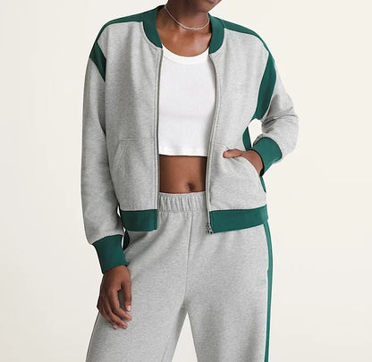 Grey two-piece tracksuit with zip jacket and wide-leg pants