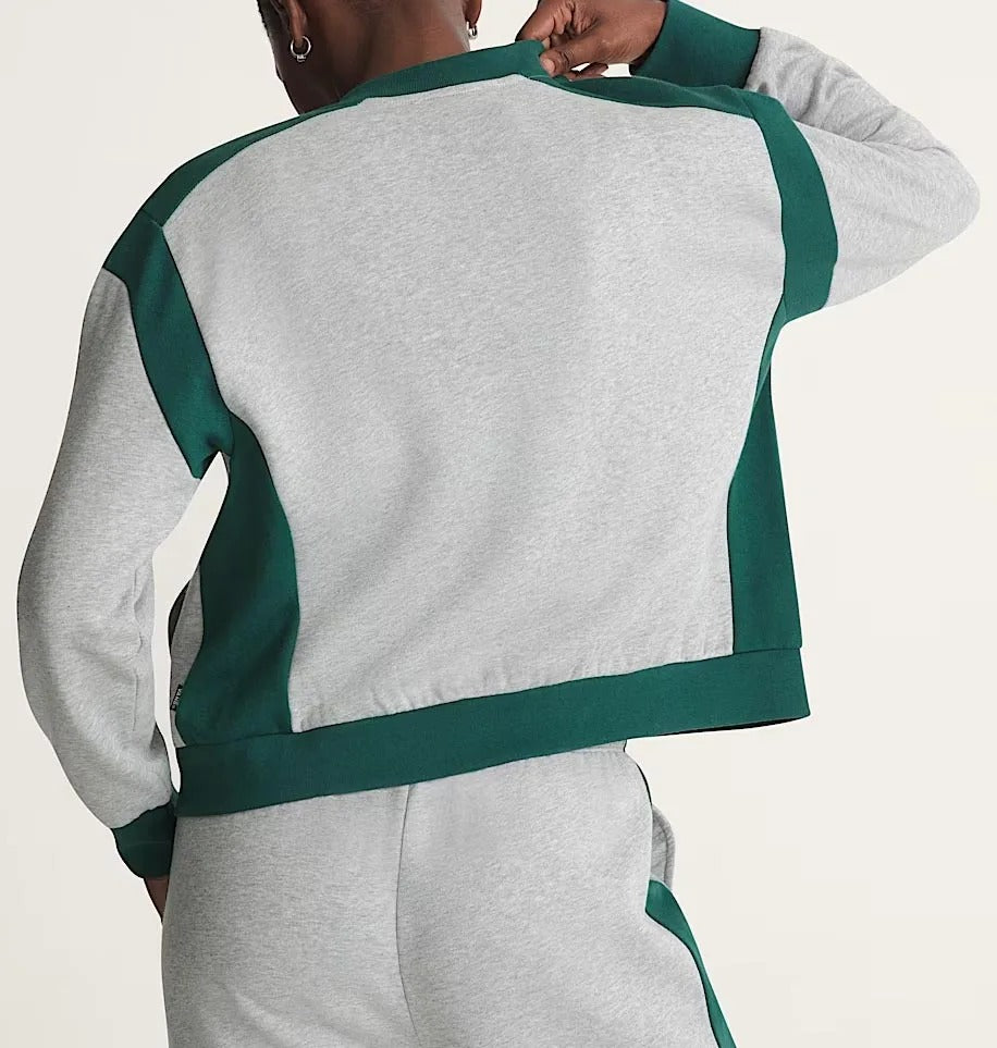 Grey two-piece tracksuit with zip jacket and wide-leg pants