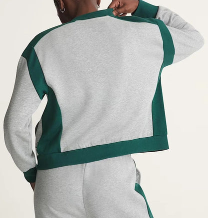 Grey two-piece tracksuit with zip jacket and wide-leg pants