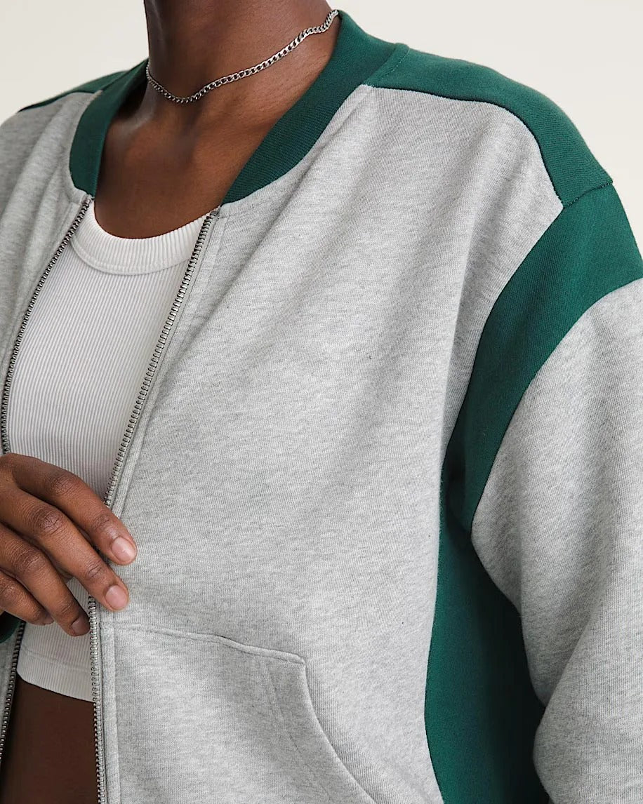 Grey two-piece tracksuit with zip jacket and wide-leg pants