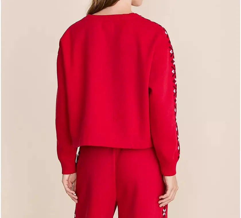 Red two-piece set with sweatshirt and tapered joggers