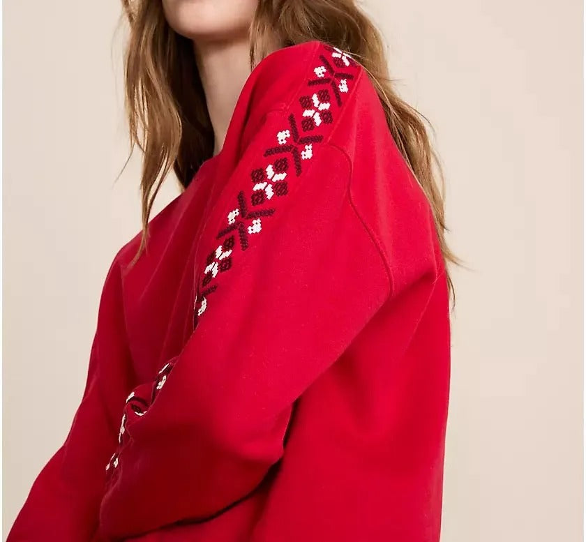 Red two-piece set with sweatshirt and tapered joggers