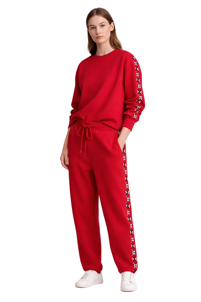 Red two-piece set with sweatshirt and tapered joggers